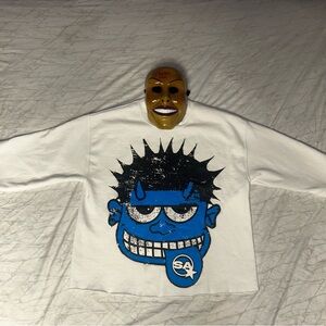 White Graphic Long Sleeve Shirt with Blue Face Design